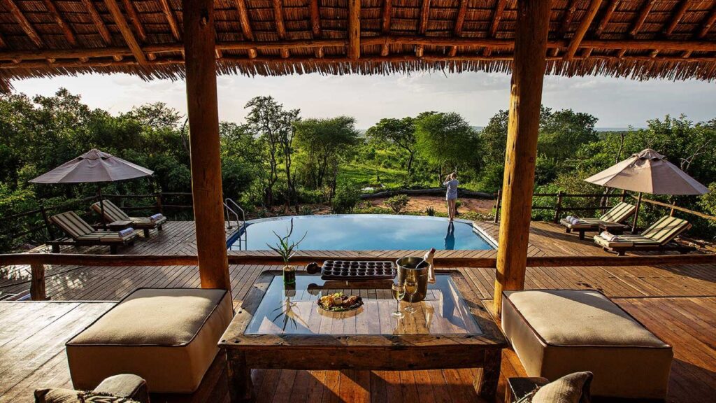 Tarangire Treetops by Elewana lodge with terrace, pool and green scenery