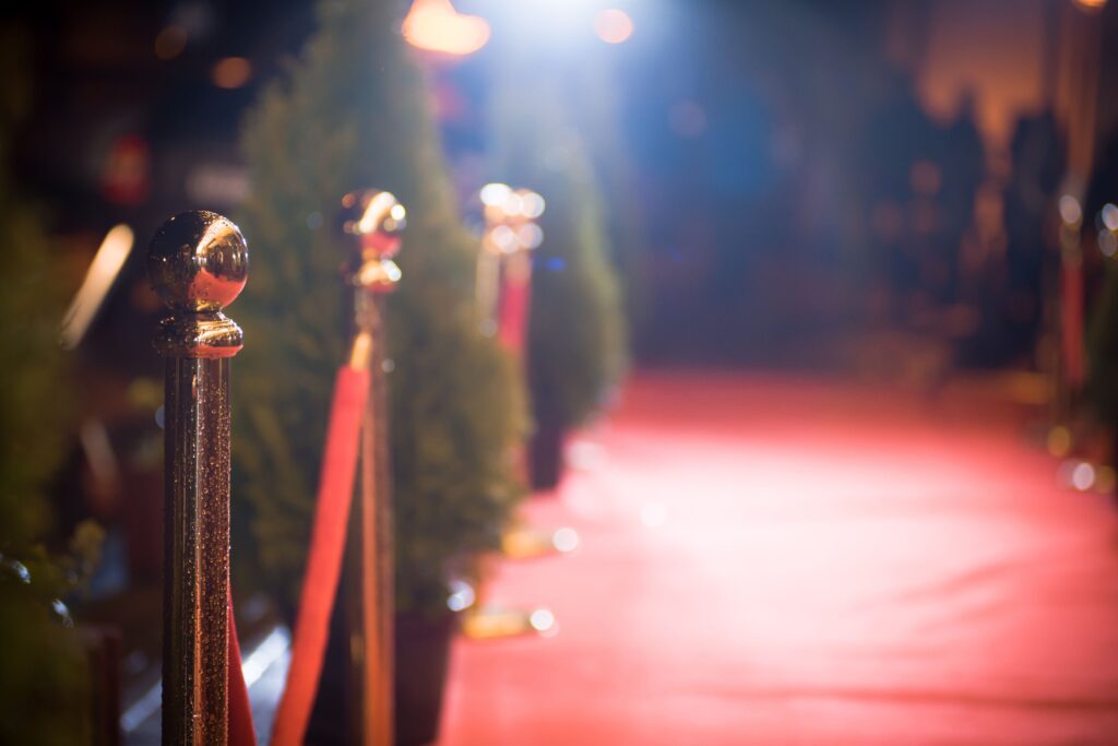Red carpet next to bushes